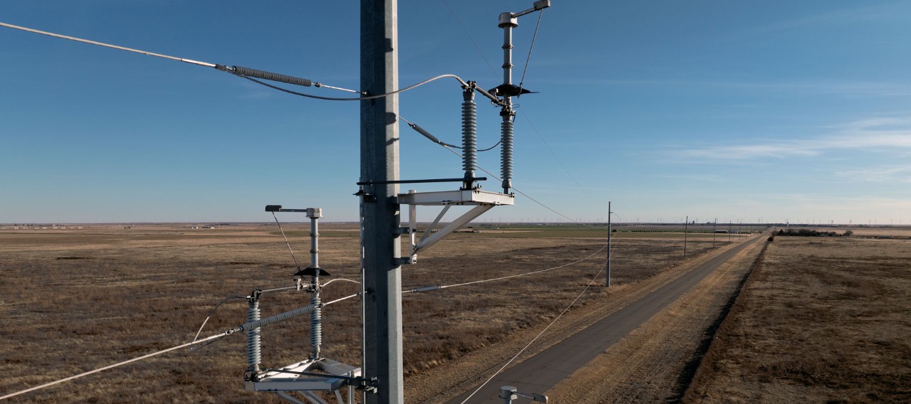 NextEra Energy transmission infrastructure and power lines across rural landscape