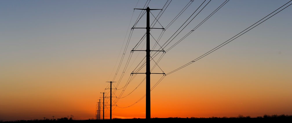 transmission lines during a golden sunset